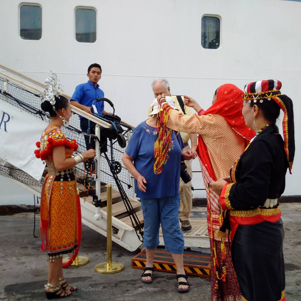 Disembarking passengers from Star Legend cruise receive warm reception at Kuching port.