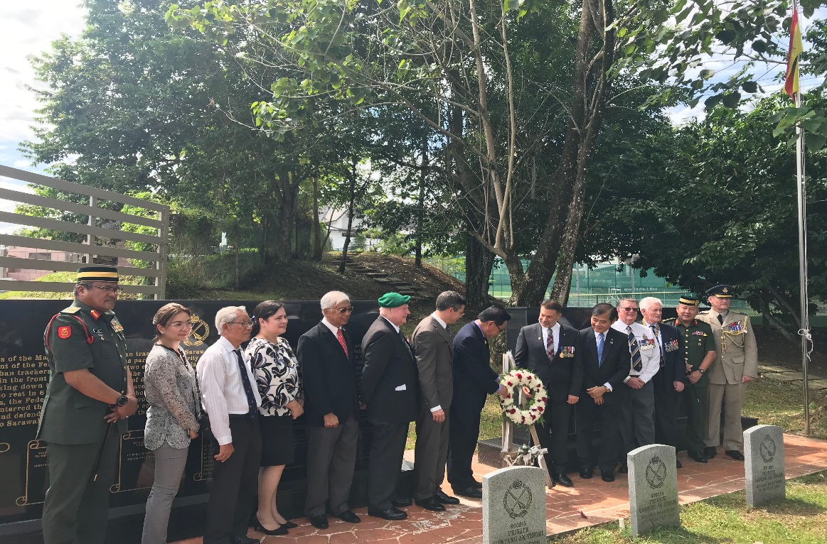 Picture shows Datuk Lee, flanked by guests, placing a bouquet of flower at the Hero’s Grave at Heroes’ Memorial ground at Jalan Taman Budaya witnessed by guests.