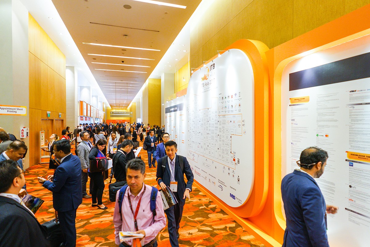Photo shows exhibitors and buyers at ITB Asia