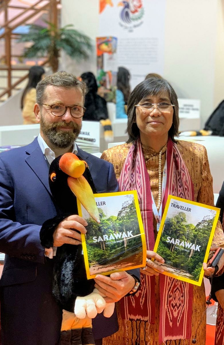 Photo shows Matt Midworth, Head of Special Projects, National Geographic Traveller (left) with STB’s Chief Executive Officer, Sharzede Datu Haji Salleh Askor proudly showing off the National Geographic Traveller’s Special Feature at the launch.